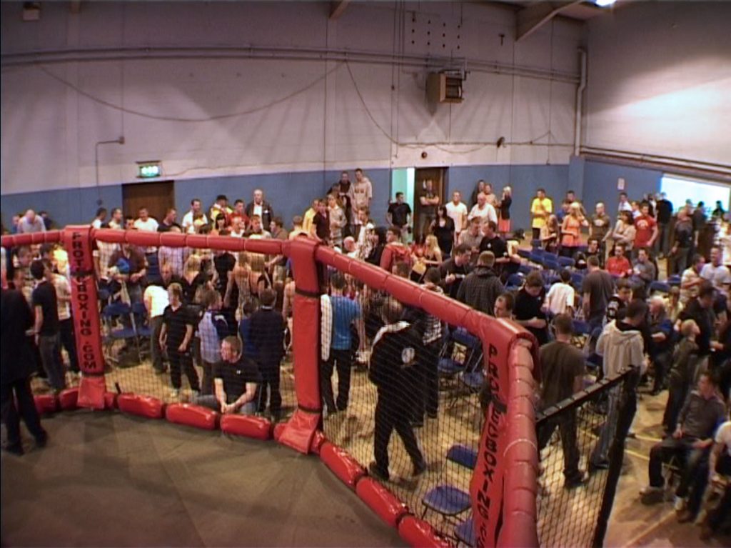 Crowds gather to watch Paddy Holohan win his fight. 